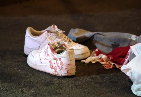 A photo of bloody sneakers from a crime scene in East Harlem