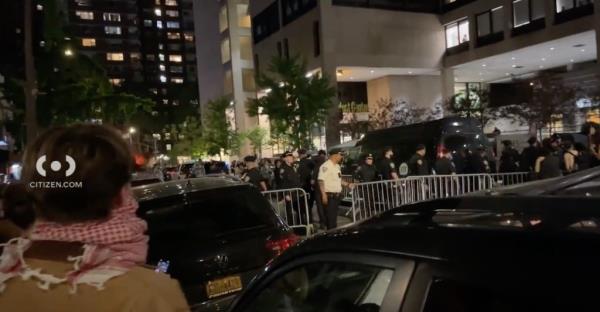 The officers set up barricades in front of the tent city as protesters locked arms in front of the encampment.