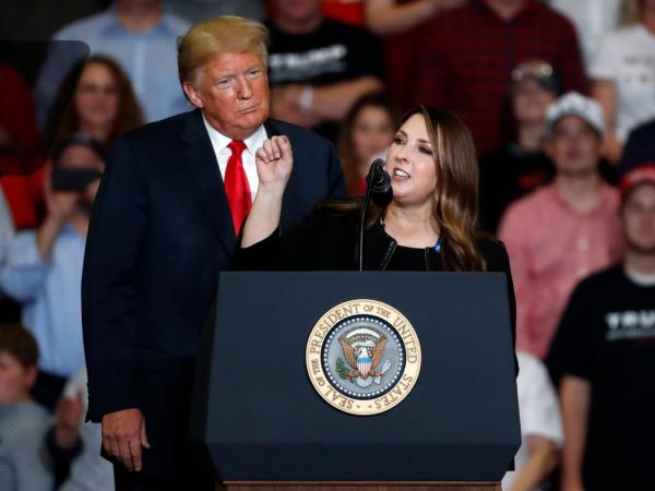 President Do<em></em>nald Trump and Republican Natio<em></em>nal Committee Chair Ro<em></em>nna McDaniel speaking at a campaign rally in Cape Girardeau, MO, in 2018.