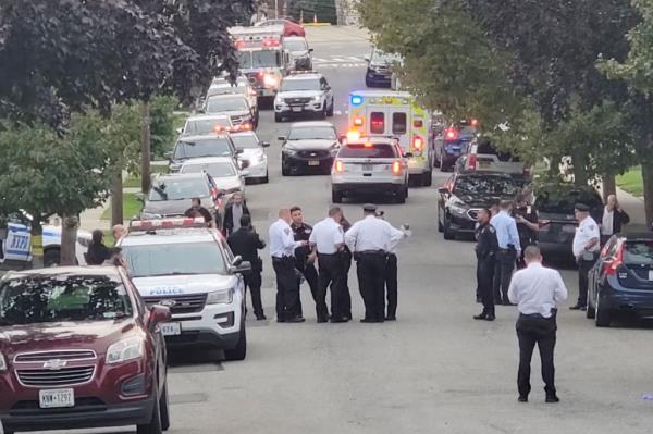 NYPD officers on the scene wher<em></em>e a man stabbed his brother to death and injured to others.