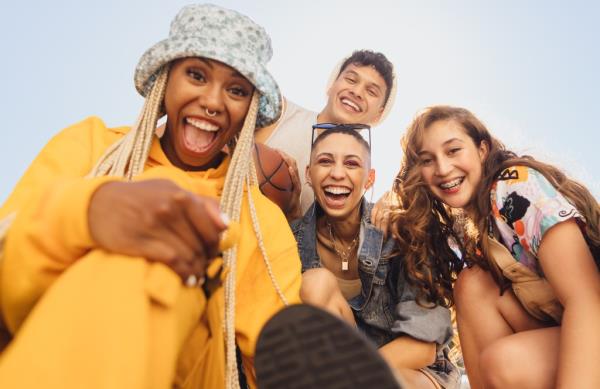 A group of young people smiling