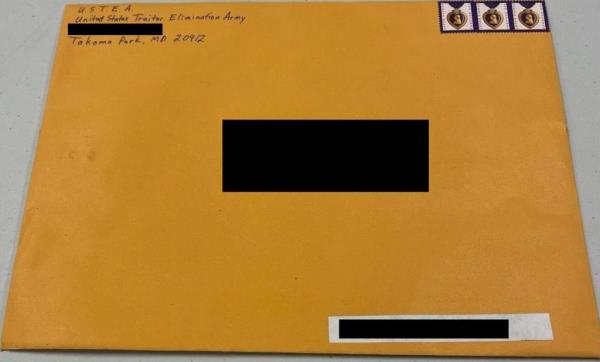 Yellow envelope marked with a black rectangle, symbolizing the suspicious packages sent to election offices as per FBI warning.