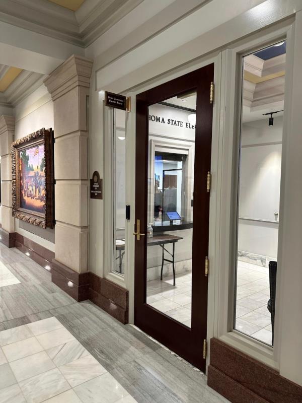 Oklahoma State Election Board Office in the state Capitol with a glass door, site wher<em></em>e suspicious packages were received