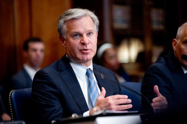 FBI Director Christopher Wray speaking during an Election Threats Task Force meeting at the Justice Department in Washington DC, September 4, 2024