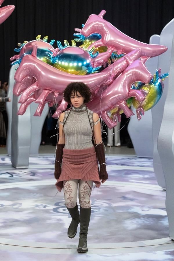 A model walks the runway wearing a skirt and gloves during the Paolina Russo show at Copenhagen Fashion Week AW24.