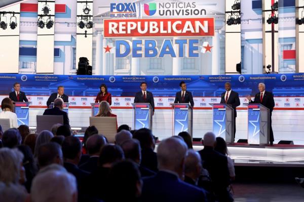 Republican presidential candidates (L-R), North Dakota Gov. Doug Burgum, former New Jersey Gov. Chris Christie, former U.N. Ambassador Nikki Haley, Florida Gov. Ron DeSantis, Vivek Ramaswamy, U.S. Sen. Tim Scott (R-SC) and former U.S. Vice President Mike Pence participate in the FOX Business Republican Primary Debate at the Ro<em></em>nald Reagan Presidential Library on September 27, 2023 in Simi Valley, California. 