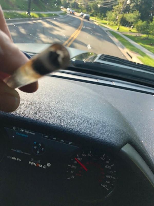 A photo from Hunter Biden's laptop of him appearing to smoke crack while driving.