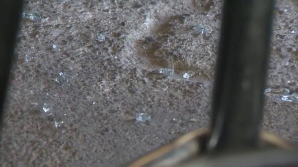 Broken glass at the Rancho Cordova business after the robbery attempt.