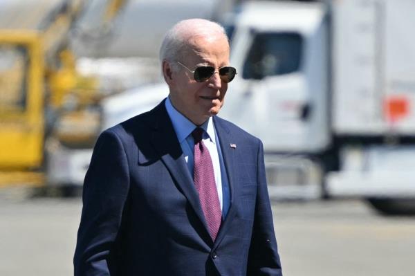 President Joe Biden makes his way to board Air Force One before departing from Seattle-Tacoma Internatio<em></em>nal Airport in Seatac, Washington, on May 11, 2024.