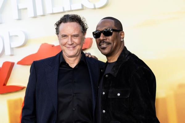 Reinhold with Eddie Murphy