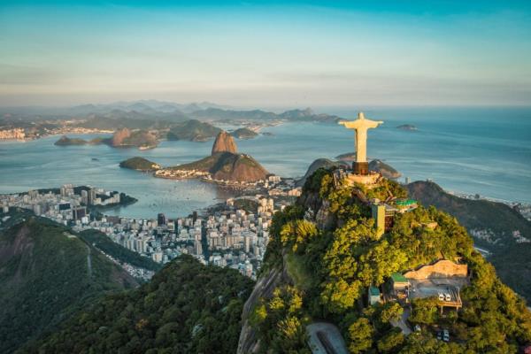 Aerial view of Christ and Botafogo Bay from high angle.