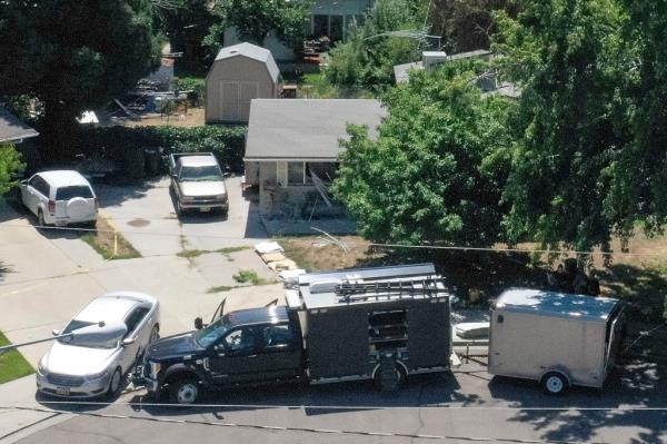 Law enforcement investigate the scene of a shooting involving the FBI in Provo, Utah, on Wednesday, Aug. 9, 2023.