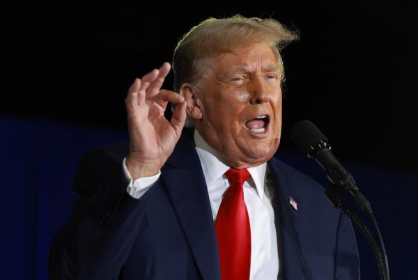 Former President Do<em></em>nald Trump speaks to members of the Club 47 group at the Palm Beach Co<em></em>nvention Center on June 14, 2024, in West Palm Beach, Florida