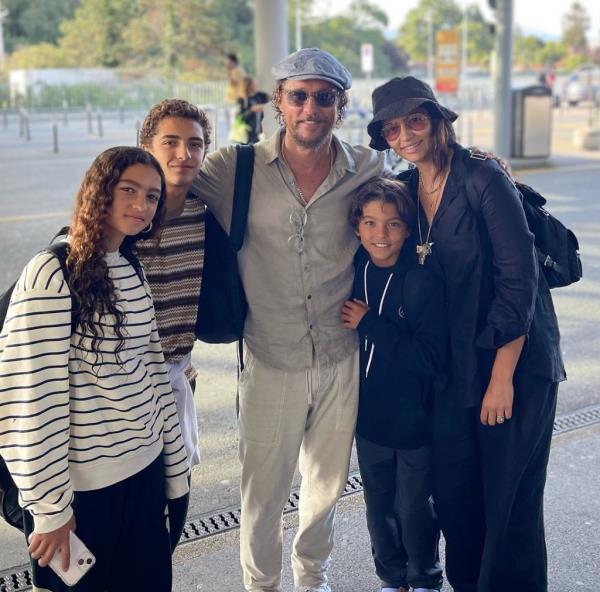 Matthew McCo<em></em>naughey and Camila Alves posing for a family photo in Texas