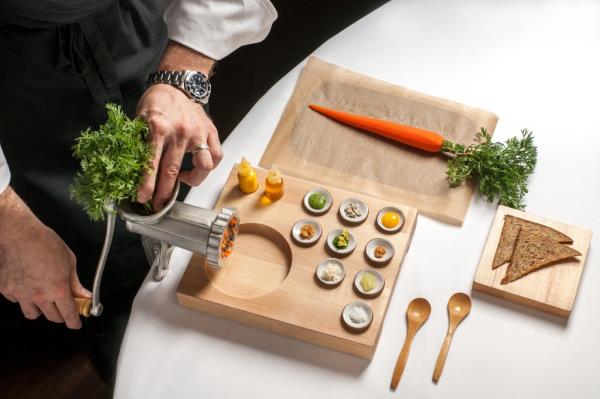 The retrospective menu includes a carrot tartare that is, essentially, flavored like steak tartare, with mini ingredients diners mix at the table.