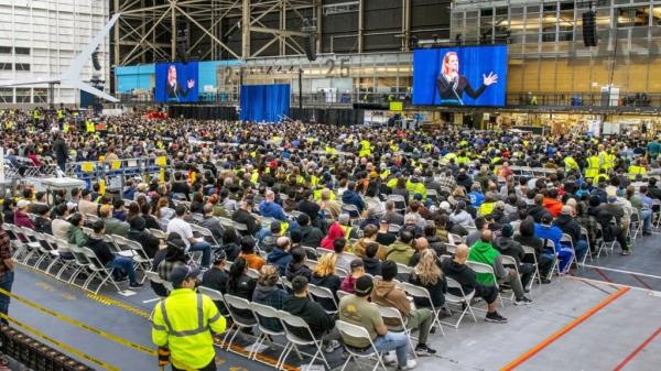 Boeing employees listened to Stan Deal, CEO of the company's Commercial Airplanes division, on Jan. 25. Deal is resigning effective immediately.