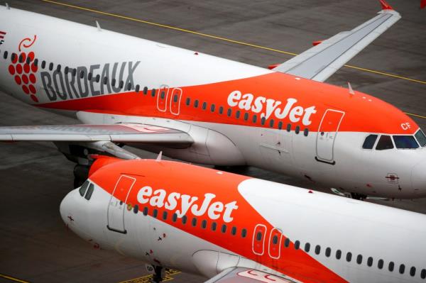 EasyJet planes are pictured on a runway.