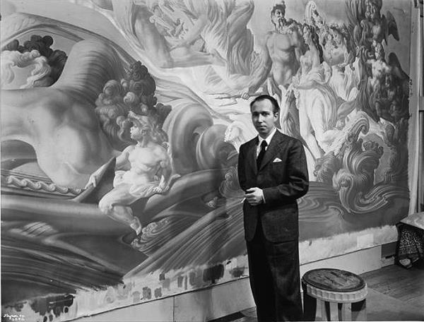 Andre Durenceau in front of his artwork.