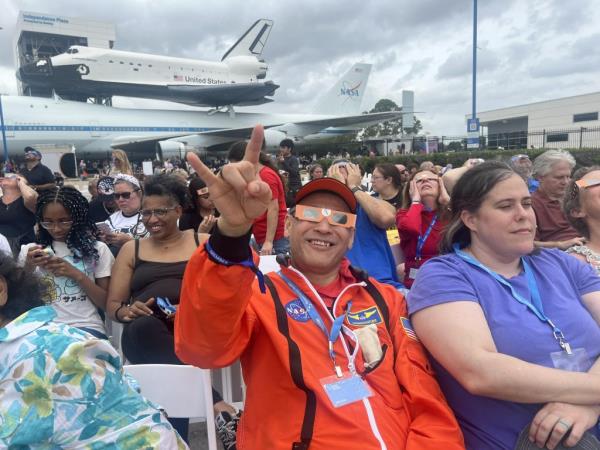 People viewing the eclipse at NASA's Space Center in Houston.