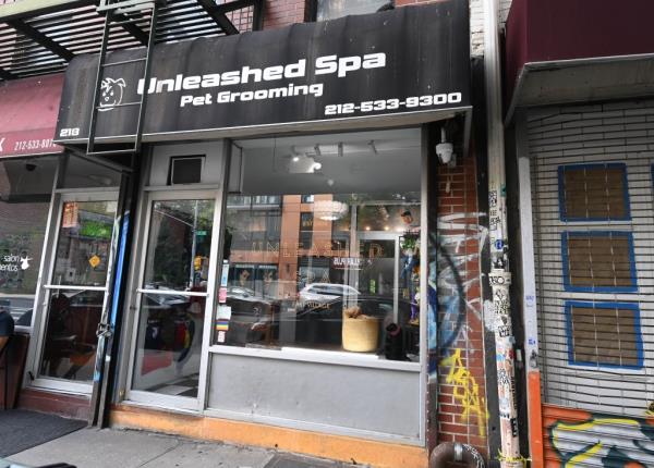 Storefront of Unleashed Spa Pet Grooming at 218 Avenue B and East 13th St. in the East Village, New York