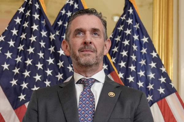 Rep. Michael Rulli, R-Ohio, in a suit and tie, arrives for his ceremo<em></em>nial swearing-in on Capitol Hill, June 25, 2024, in Washington