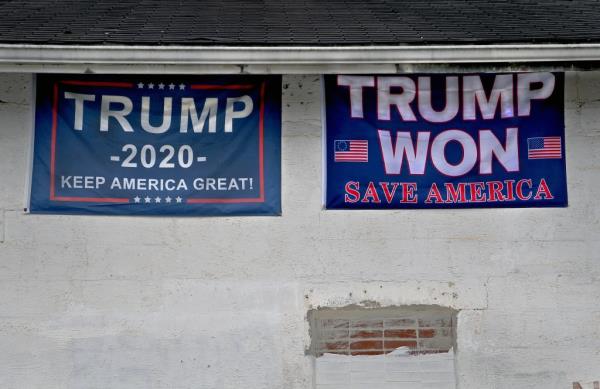 A sign on an shuttered building proclaims that Trump won the 2020 election in Bancroft, West Virginia on October 23, 2021.