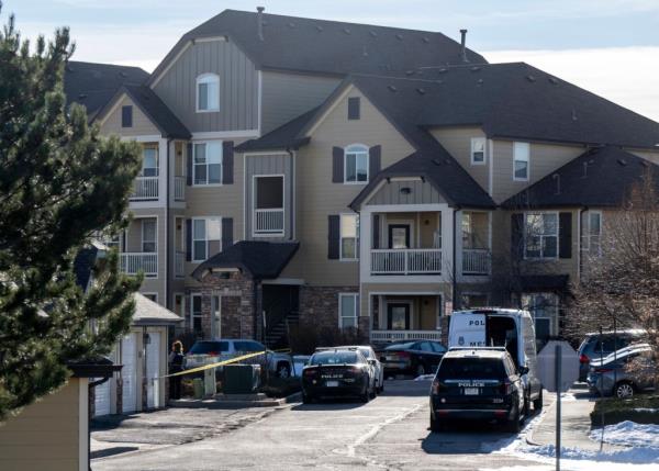 Colorado Springs Police Department investigators and officers work on the scene of a burglary that resulted in the deaths of two people at the Palomino Ranch apartment complex on Tuesday, Dec. 19, 2023 in Colorado Springs, Colo.