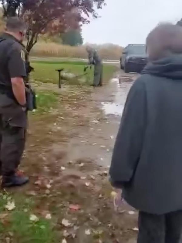 A screengrab from the video showing Loza with his handgun as the deer lay dead in front of him.