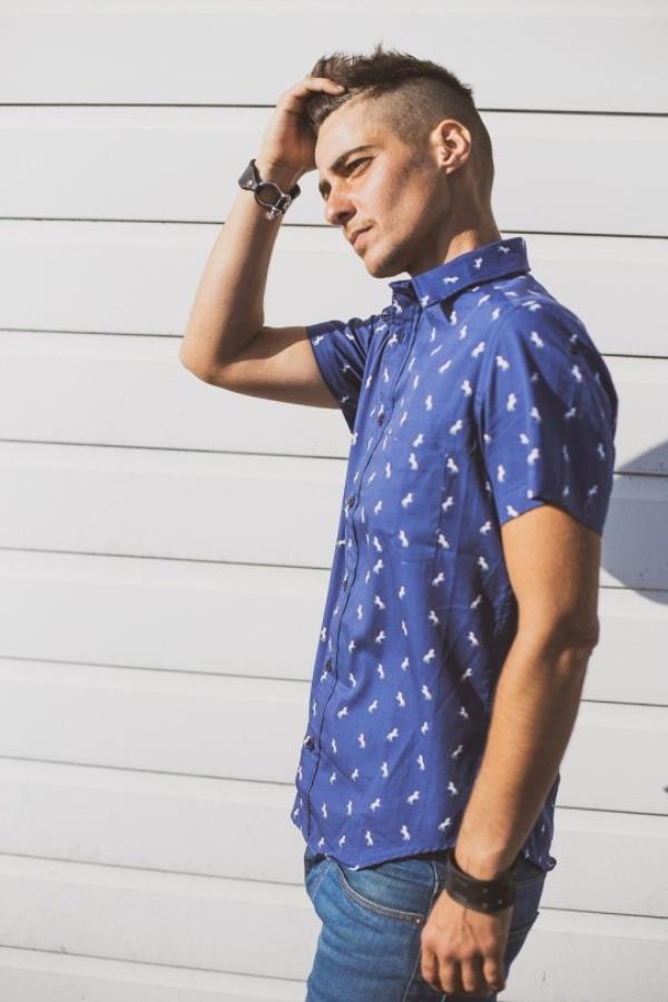 Gfw's colourful gender neutral shirts modelled by man outside.