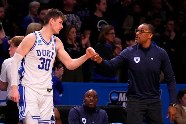 Duke Blue Devils center Kyle Filipowski (30) reacts after defeating the Vermont Catamounts in the first round of the 2024 NCAA Tournament at the Barclays Center. 