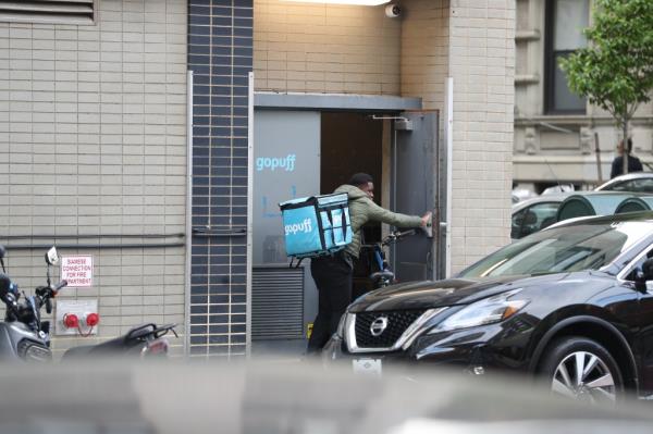 Marco Botarelli standing in front of the Gopuff store on Lexington Avenue, upset a<em></em>bout delivery workers parking and idling cars outside his building.