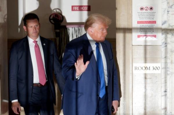 Ex-President Do<em></em>nald Trump (right) attended the civil fraud trial for a second straight day in New York Supreme Court 