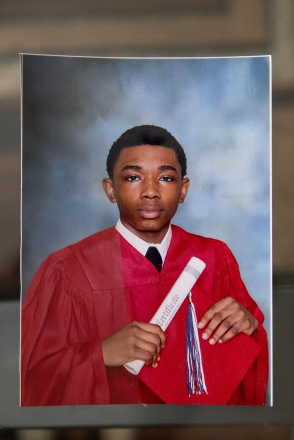 Copy photo of 15 year-old Tristan Sanders from 8th grade graduation shot during an interview on Tuesday, October 29, 2024 in Brooklyn, NY.   Tristan Sanders was shot and killed Sunday at the Albany Houses. 