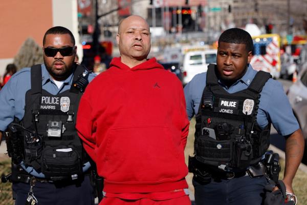 Kansas City Chiefs fan Denton Loudermill in cuffs