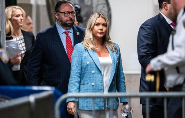 Trump campaign press secretary Karoline Leavitt and Trump adviser Jason Miller arriving at Manhattan Criminal Court in New York City