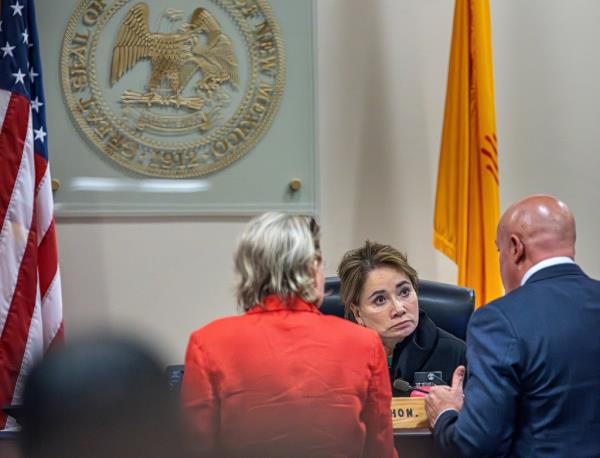 Judge Mary Marlowe Sommer, prosecutor Kari Morrissey, and defense attorney Jason Bowles discussing testimony at the 'Rust' trial in Santa Fe