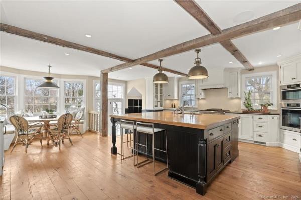 The kitchen with a breakfast nook.