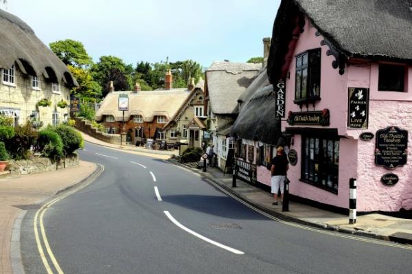 Shanklin, Isle of Wight, UK. June 20, 2018. Holidaymakers browse the gift shops in the quaint picturesque village of old Shanklin on the Isle of Wight, UK.; Shutterstock ID 1123413725; Purchase Order: -