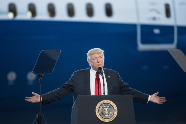 President Do<em></em>nald Trump addresses a crowd during the debut event for the Dreamliner 787-10 at Boeing's South Carolina facilities on February 17, 2017 in North Charleston, South Carolina.