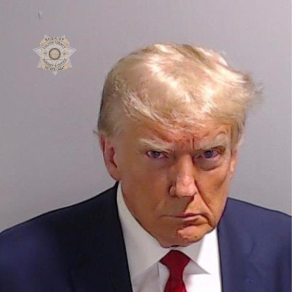 Former President Do<em></em>nald Trump was photographed for a police mugshot after his arrest on August 24 at the Fulton County Jail in Georgia 