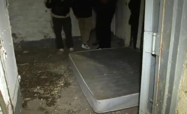 A mattress lies on a squalid floor in Washington Heights.