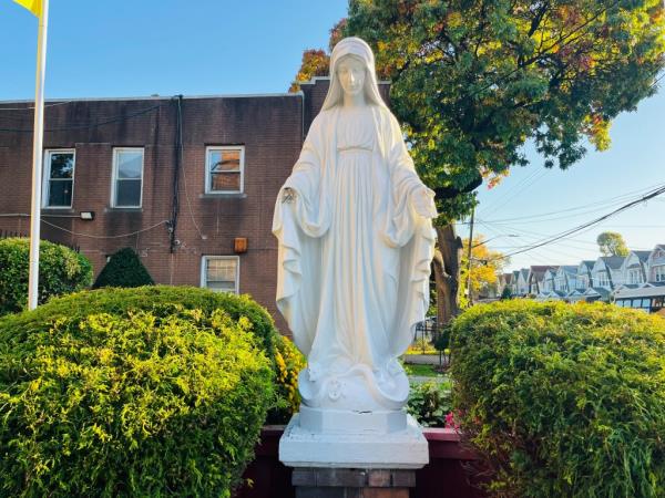 Damaged Virgin Mary statue in Brooklyn. 