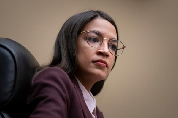 Rep. Alexandria Ocasio-Cortez, D-N.Y., attends a House Oversight Committee hearing on high pres<em></em>cription drugs prices shortly after her private meeting with Speaker of the House Nancy Pelosi, D-Calif., on Capitol Hill in Washington, Friday, July 26, 2019