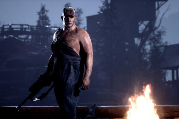 Screenshot of The Quarry game featuring large menacing person holding gun at campfire 