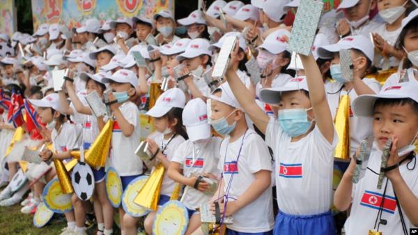 FILE - Children cheer during the 73rd anniversary of the Internatio<em></em>nal Children's Day at the Taeso<em></em>ngsan Amusement Park in Pyongyang, North Korea on June 1, 2023. 