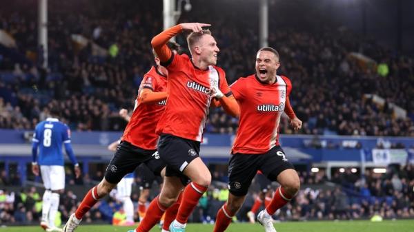 Cauley Woodrow celebrates his winner for Luton