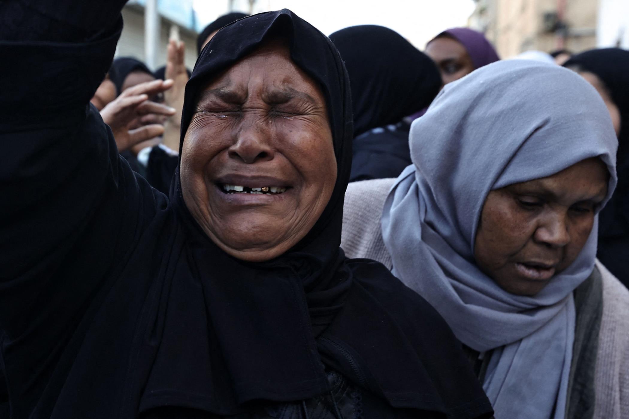 A relative cries during the funerals of some of the Palestinians killed during a dayslong Israeli raid in a refugee camp in Tulkarm, the occupied West Bank, Palestine, Jan. 19, 2024. (AFP Photo)